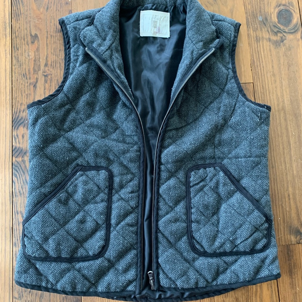 Large gray and black quilted vest